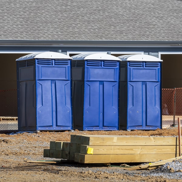 what is the cost difference between standard and deluxe porta potty rentals in Linn Grove